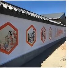 Hexagon art panels printed along an exterior compound wall — exterior wall art printing